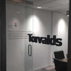 Gamma installed dimensional letters and cut letter vinyl at Vail Systems.